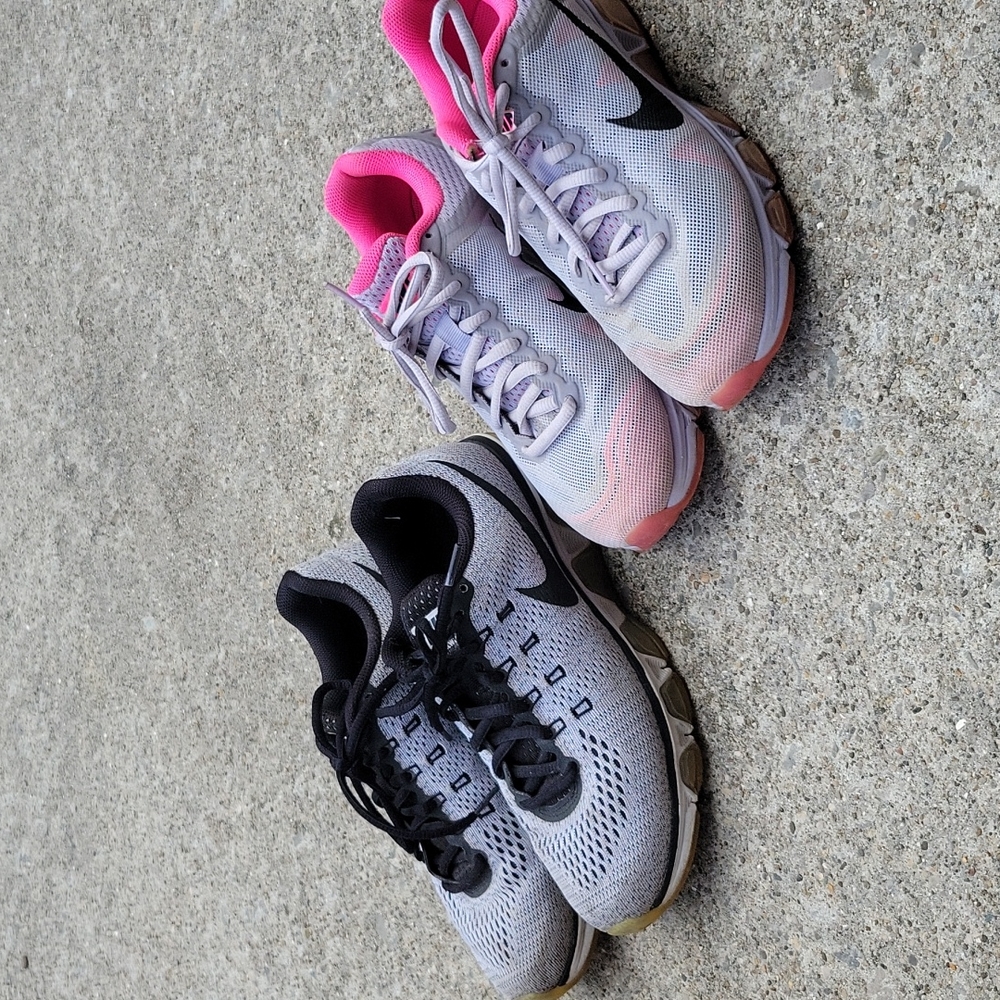 WOMENS Nike. 2 pairs of Tailwinds. Black are Tailwind 8. Pink are Tailwind 7.